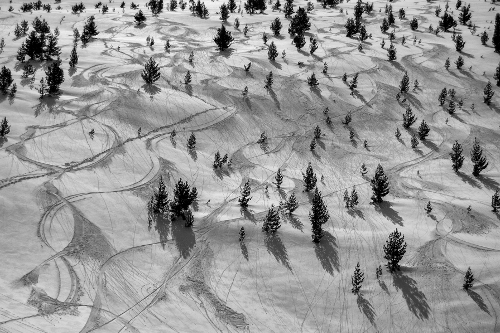 Lines left after skiing on the snowy slopes of Baba Mountain below the peak Pelister, Pelister National Park, Macedonia